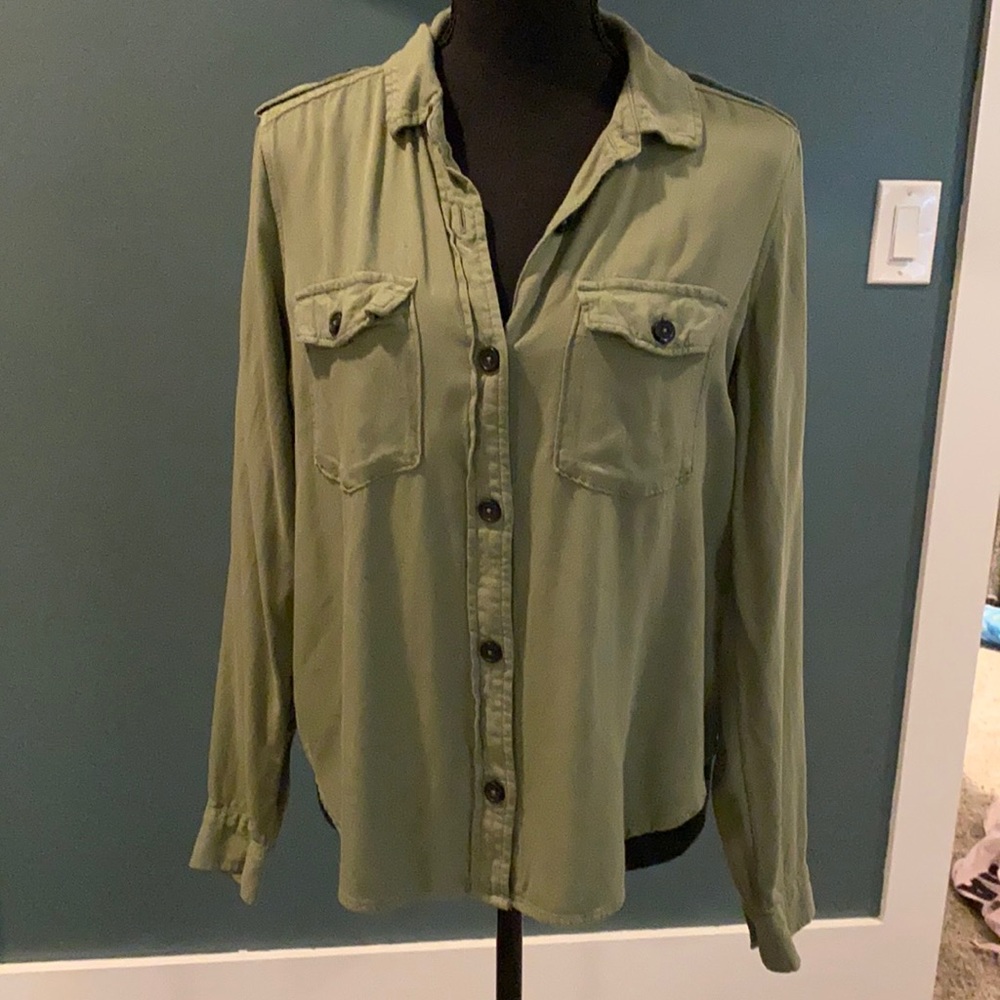 Light green women’s button up shirt. Size M.